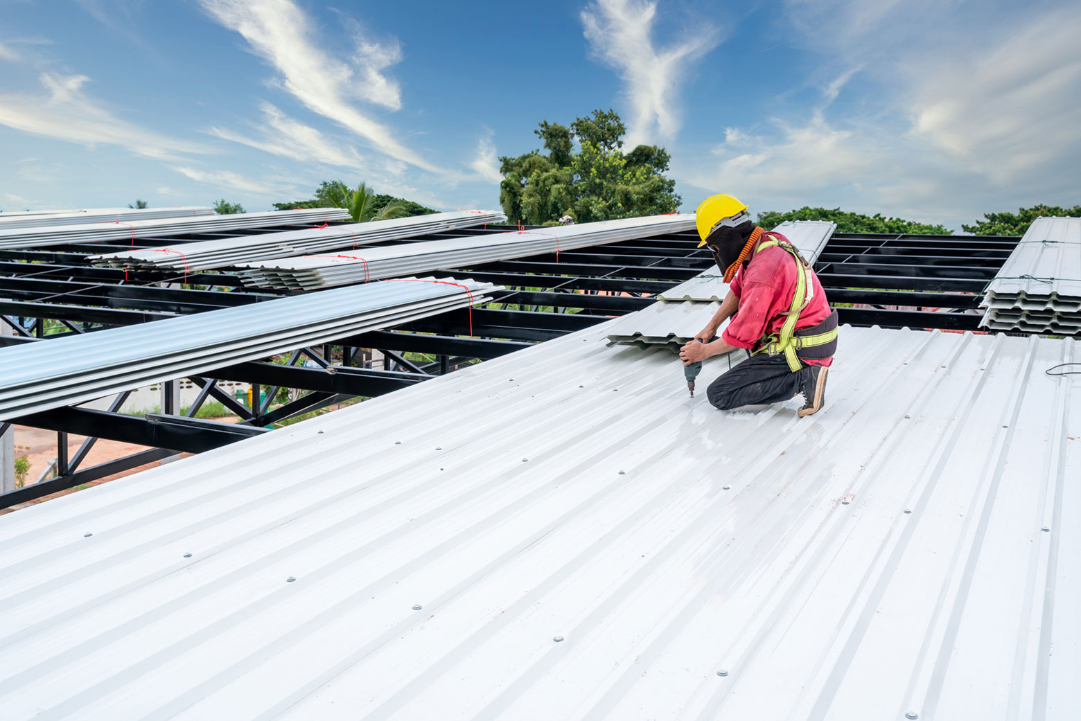 Commercial property receiving a complete metal roof replacement